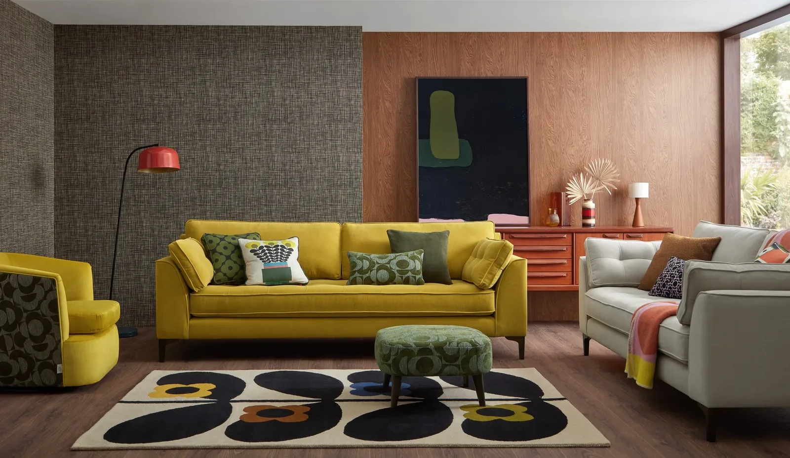 An Orla Kiely Arklow sofa, armchair and footstool in a patterned interior